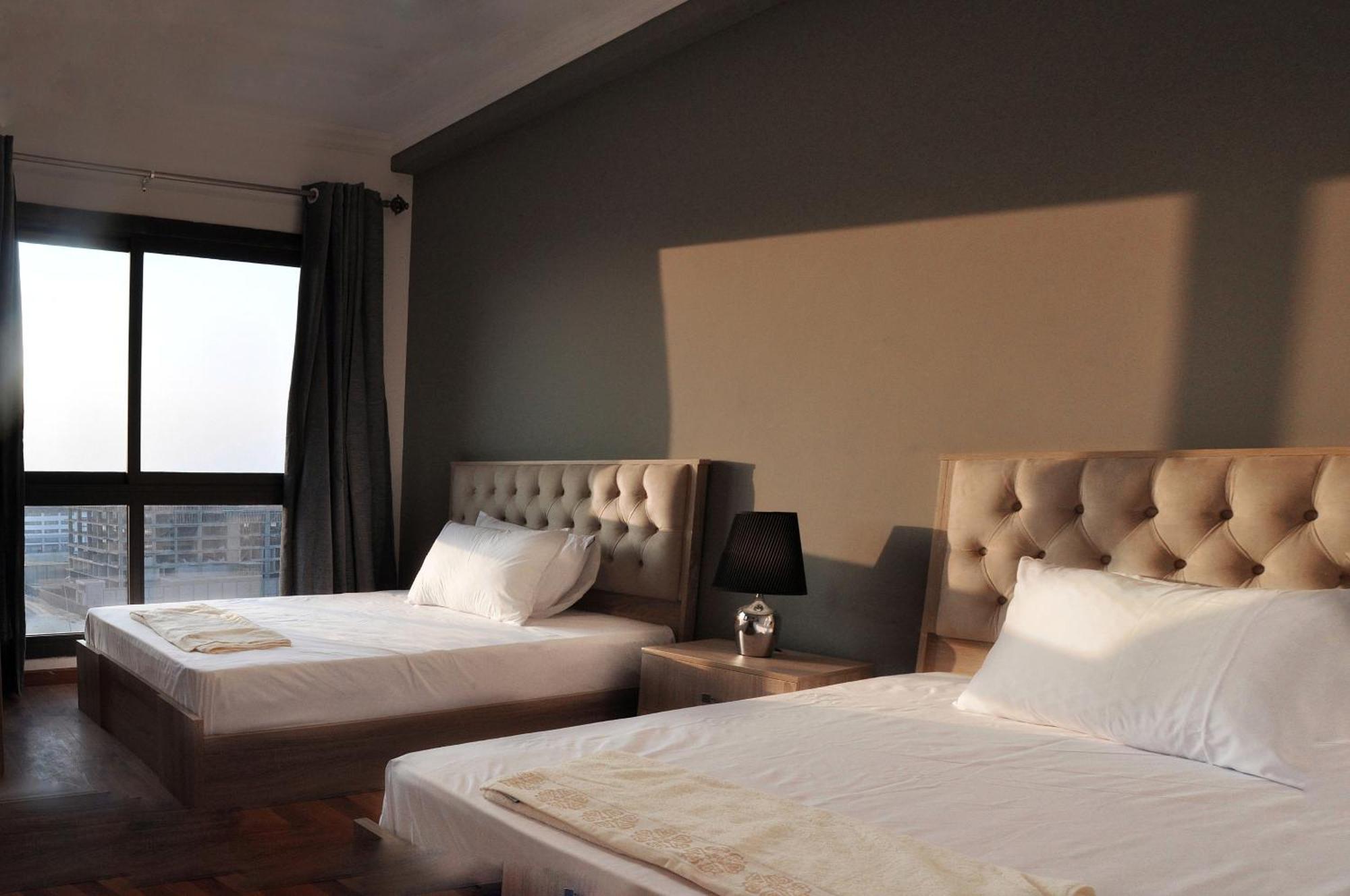 Axxodia- Duplex Porto New Cairo Aparthotel Exterior photo